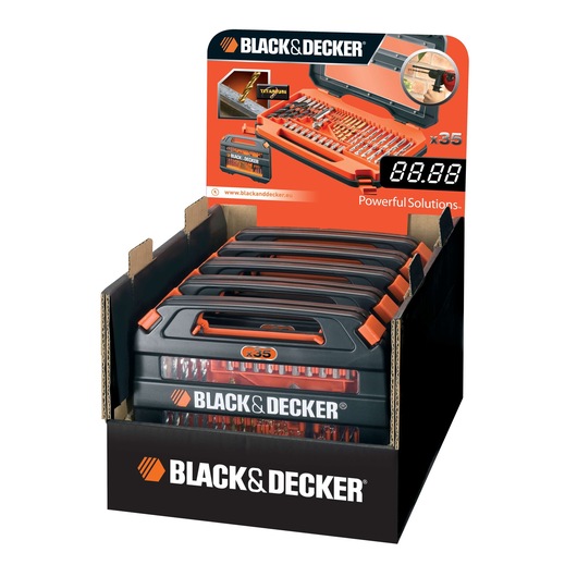 A display box containing multiple BLACK+DECKER tool kits, each labeled with 'x35' and featuring an assortment of bits and accessories. The packaging is black and orange, with the BLACK+DECKER logo prominently shown on both the kits and the display.