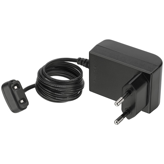 BLACKDECKER BCKM1012KR power adapter with European plug and attached black charging cable, studio angle.
