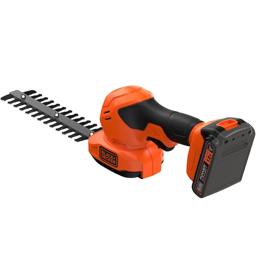 A BLACK+DECKER cordless handheld garden tool with an orange and black design, featuring a battery pack and a blade attachment for trimming hedges or shrubs.