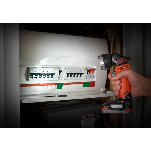 Photo of BLACKDECKER BDCCF12N cordless flashlight in use near electrical panel.