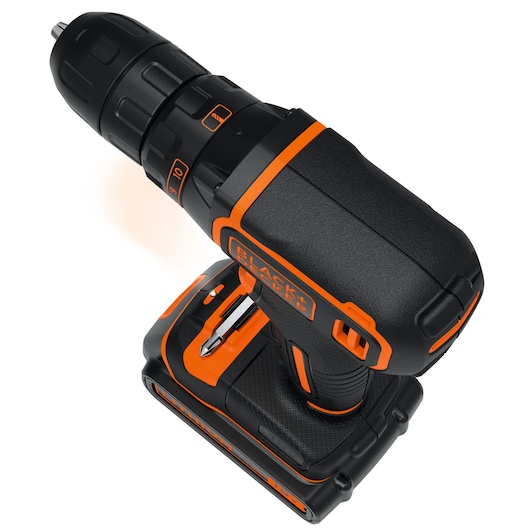 A BLACK+DECKER cordless power drill with black and orange design, viewed from above on a white background.