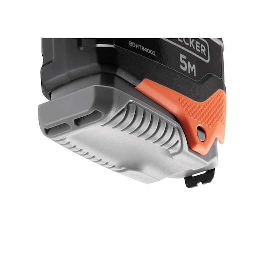 BLACKDECKER tape measure BDHT84002, close-up angled view with black, grey, and orange rubber grip details.