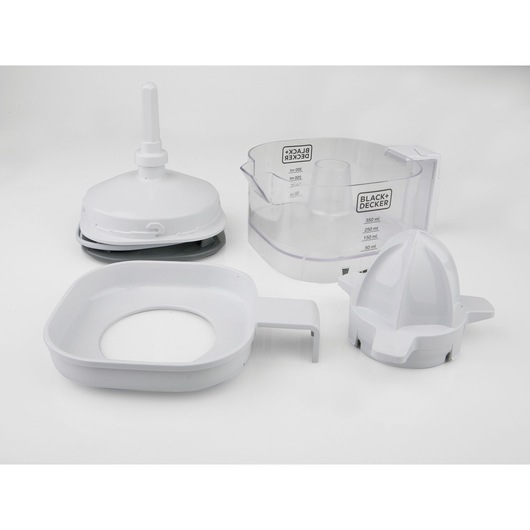 Photo of BLACK+DECKER BXCJ25E citrus juicer disassembled, showing white plastic parts and a transparent juice container, front angle.