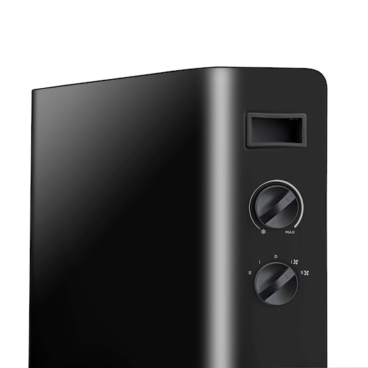 Photo of BLACKDECKER BXCSH2000E black heater, close-up angle with control knobs and air vent visible.