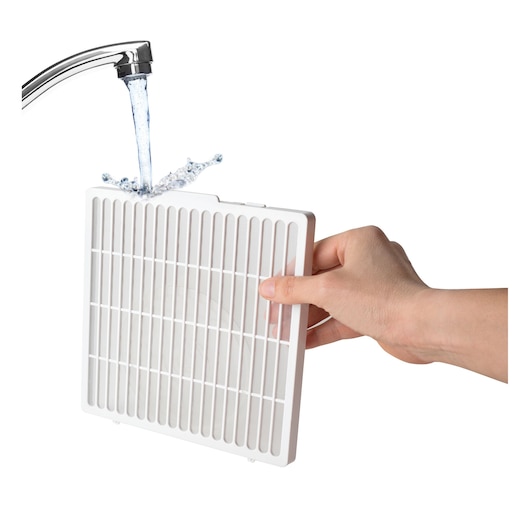 Photo of a hand cleaning a white BLACKDECKER BXDH12E filter under running water, front angle.