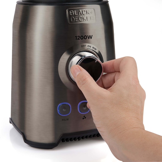 Photo of BLACKDECKER BXJB1200E blender base with hand turning speed dial, brushed metal finish, front angle.