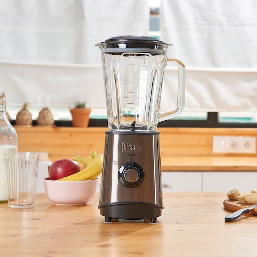 BLACK+DECKER BXJB800E blender with glass jar and stainless steel base on kitchen counter, front angle.
