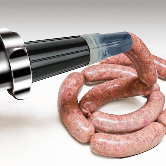 BLACKDECKER BXMMA1000E meat mincer attachment filling sausage casing, close-up on white background.
