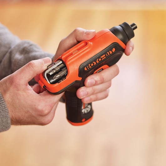 Photo of BLACKDECKER CS36BSCES cordless screwdriver with built-in bit storage, orange and black, handheld.