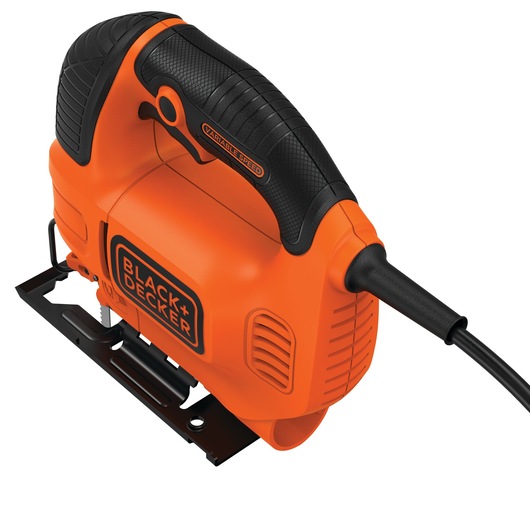 Close-up image of a BLACK+DECKER KS701E electric jigsaw, featuring an orange and black ergonomic handle and power cord.