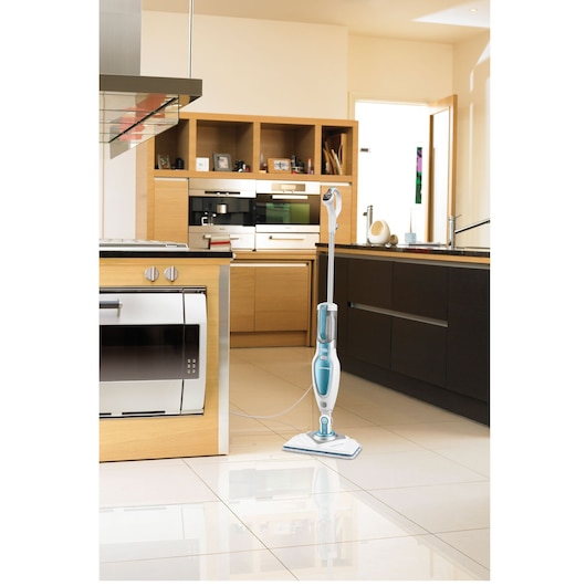 BLACKDECKER FSM1630 steam mop on tile floor in modern kitchen, upright position, blue and white design.