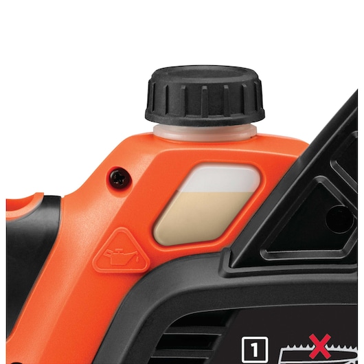 Close-up of an orange and black BLACK+DECKER tool, focusing on the oil reservoir with a black cap and oil level indicator. The oil symbol is embossed near the reservoir.