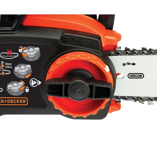 Close-up view of a BLACK+DECKER chainsaw, showing the chain tension adjustment dial and illustrated instructions for adjusting the chain. The chain and part of the guide bar with 'OREGON' branding are visible.