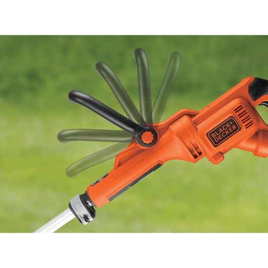BLACKDECKER GL7033CAKIT grass trimmer handle close-up, showing adjustable black handle on orange body, side angle.