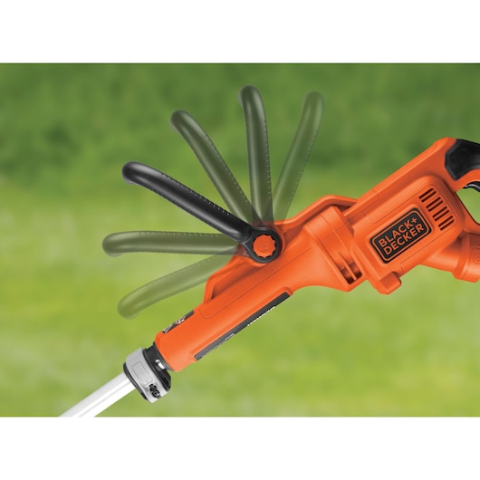 Photo of BLACK+DECKER GL9035 grass trimmer handle with adjustable black auxiliary handle, side angle, on green background.