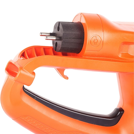 Close-up of the handle and power plug of an orange BLACK+DECKER electric tool.