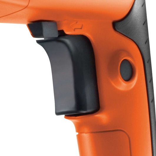 Close-up photo of BLACKDECKER KD885KC drill handle in orange and black, showing trigger and grip details.