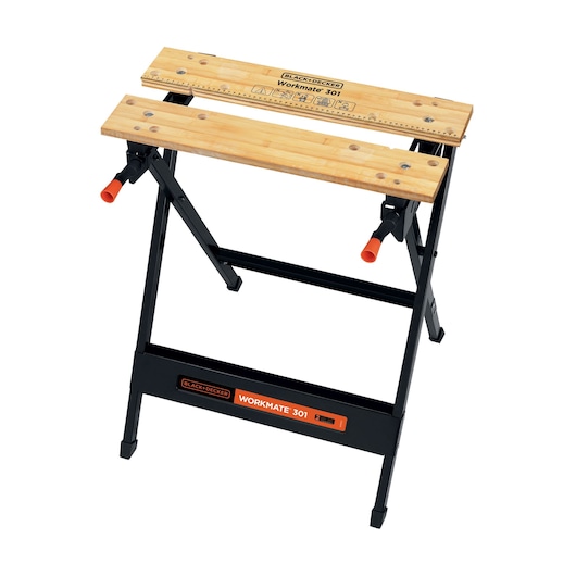 A BLACK+DECKER Workmate 301 portable workbench with a light wooden surface and black metal folding legs, featuring two orange-handled clamps.