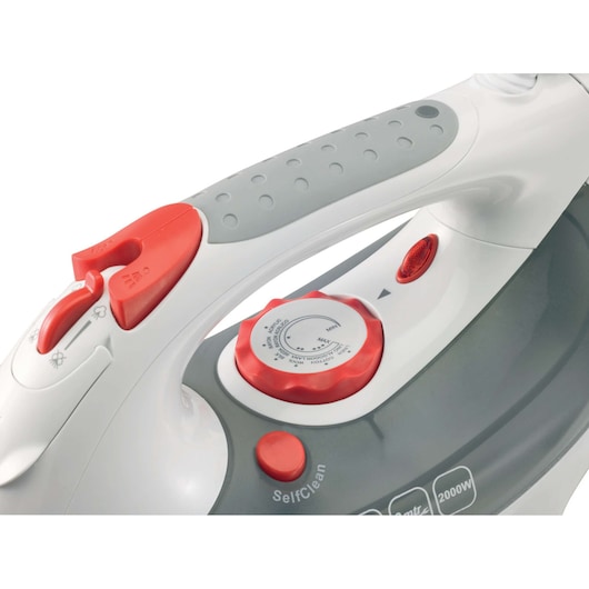 Close-up of BLACKDECKER XT2030 steam iron handle and control dial, white and grey with red buttons, side angle.