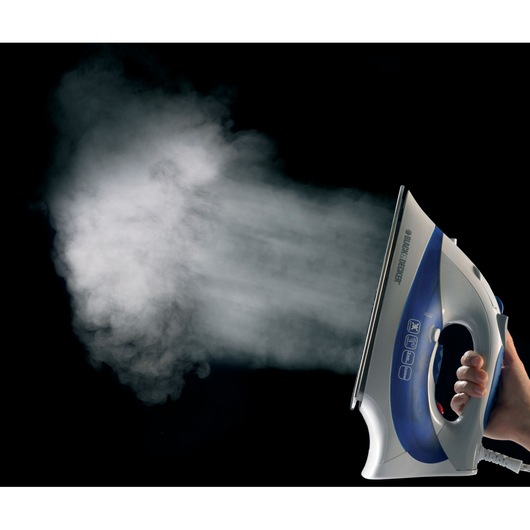 Photo of BLACK+DECKER XT2200 steam iron releasing powerful steam, white and blue, handheld on black background.